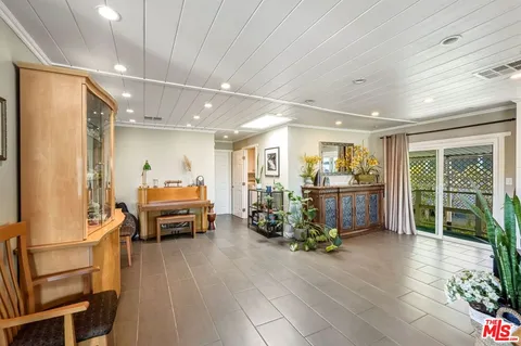 a bed room with a bed and a couch