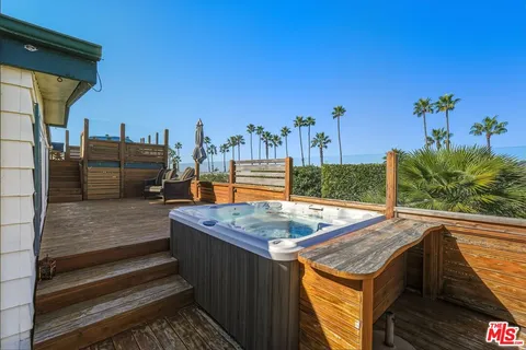 a view of a swimming pool with a terrace