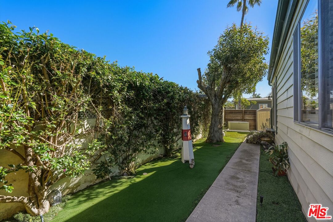 29500 Heathercliff Road, Unit 87 Malibu, CA 90265 - Photo 42 of 58 a view of a house with a yard