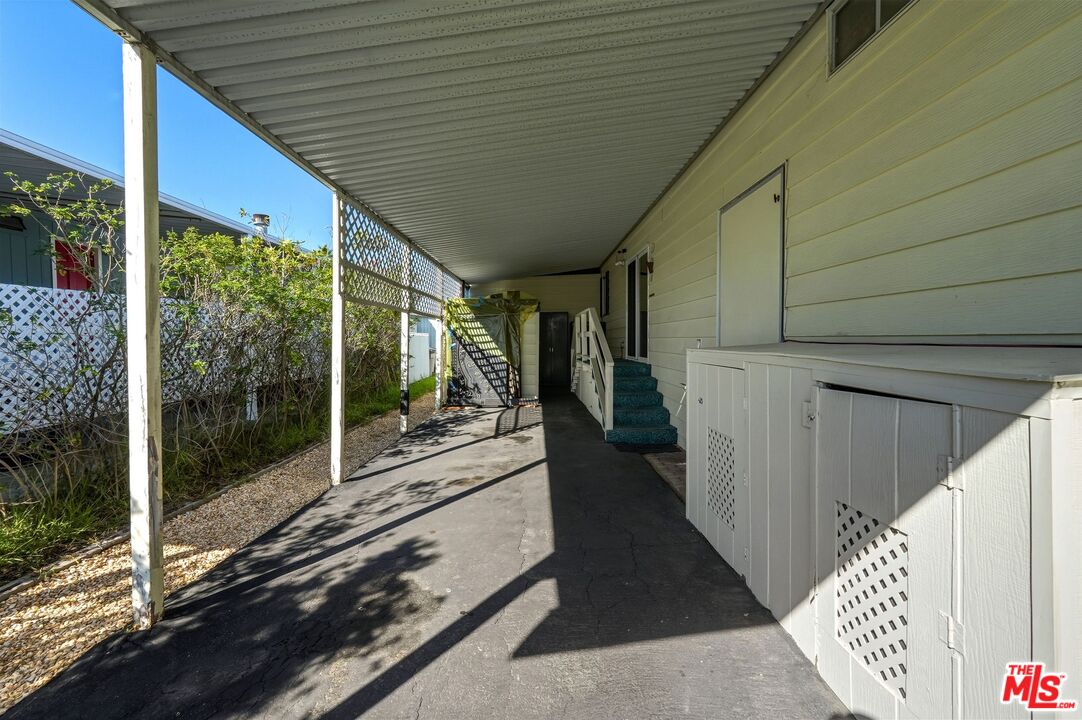 29500 Heathercliff Road, Unit 87 Malibu, CA 90265 - Photo 47 of 58 a view of a house with a balcony