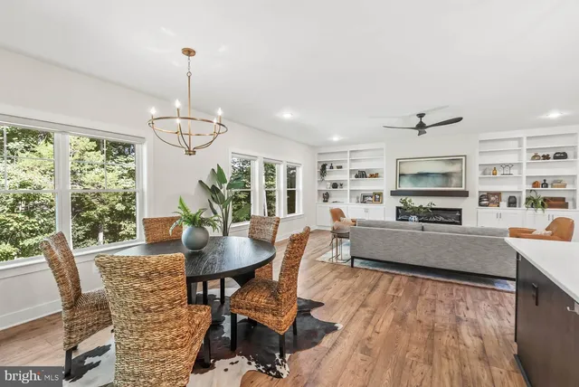 a view of a room with wooden floor and outdoor space