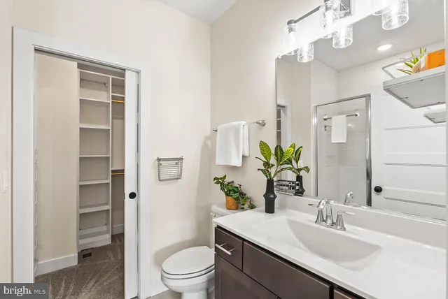 a bathroom with a bathtub and shower curtain