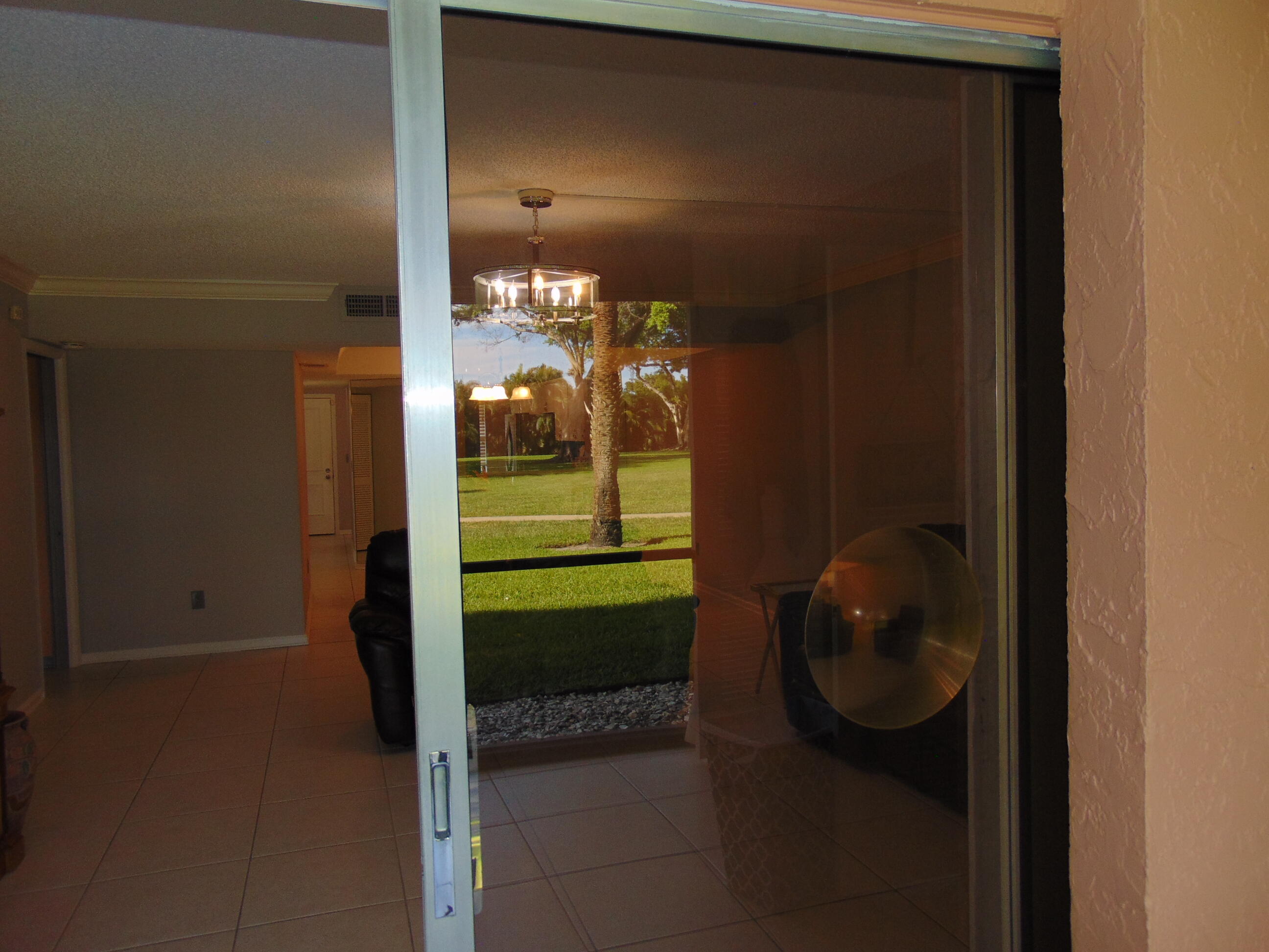 9220 Southwest 14th Street, Unit 3103 Boca Raton, FL 33428 - Photo 20 of 58 a bathroom with a light fixture and a sink