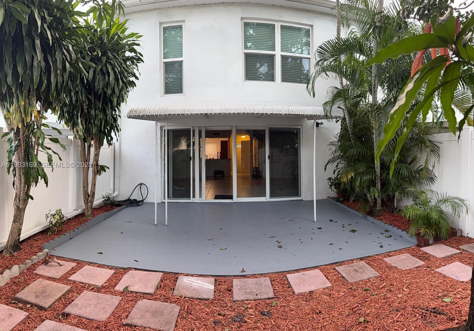 3908 Southwest 67th Terrace, Unit 112 Davie, FL 33314 - Photo 12 of 17 a view of outdoor space yard and front view of a house