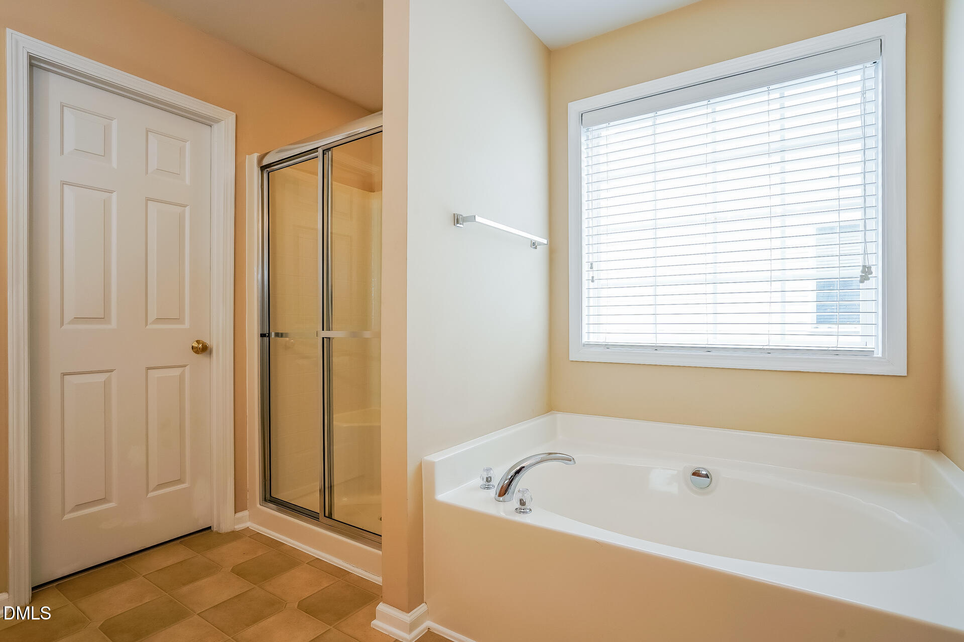 2279 Lazy River Drive Raleigh, NC 27610 - Photo 13 of 24 a bathroom with a bathtub