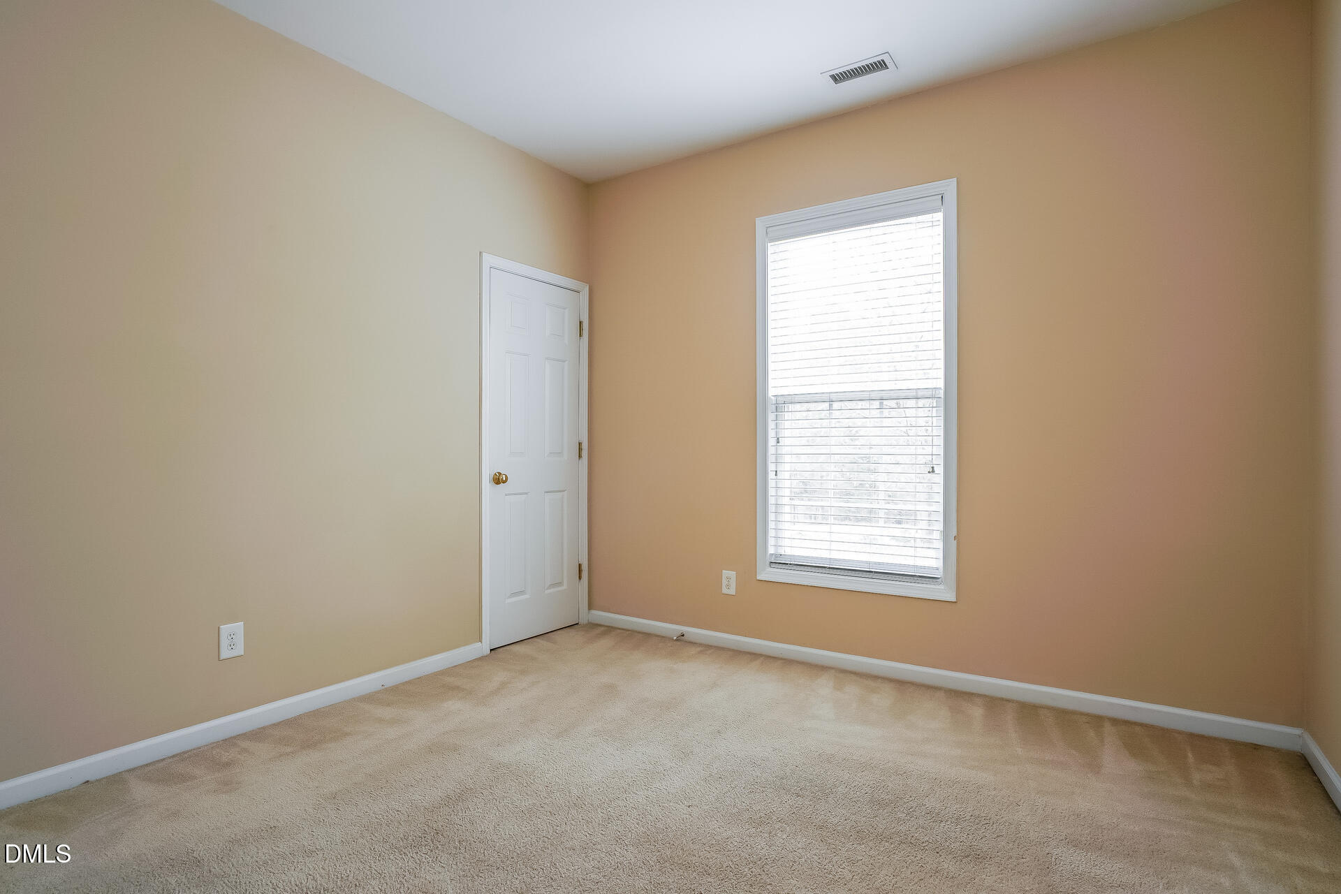 2279 Lazy River Drive Raleigh, NC 27610 - Photo 16 of 24 an empty room with a window