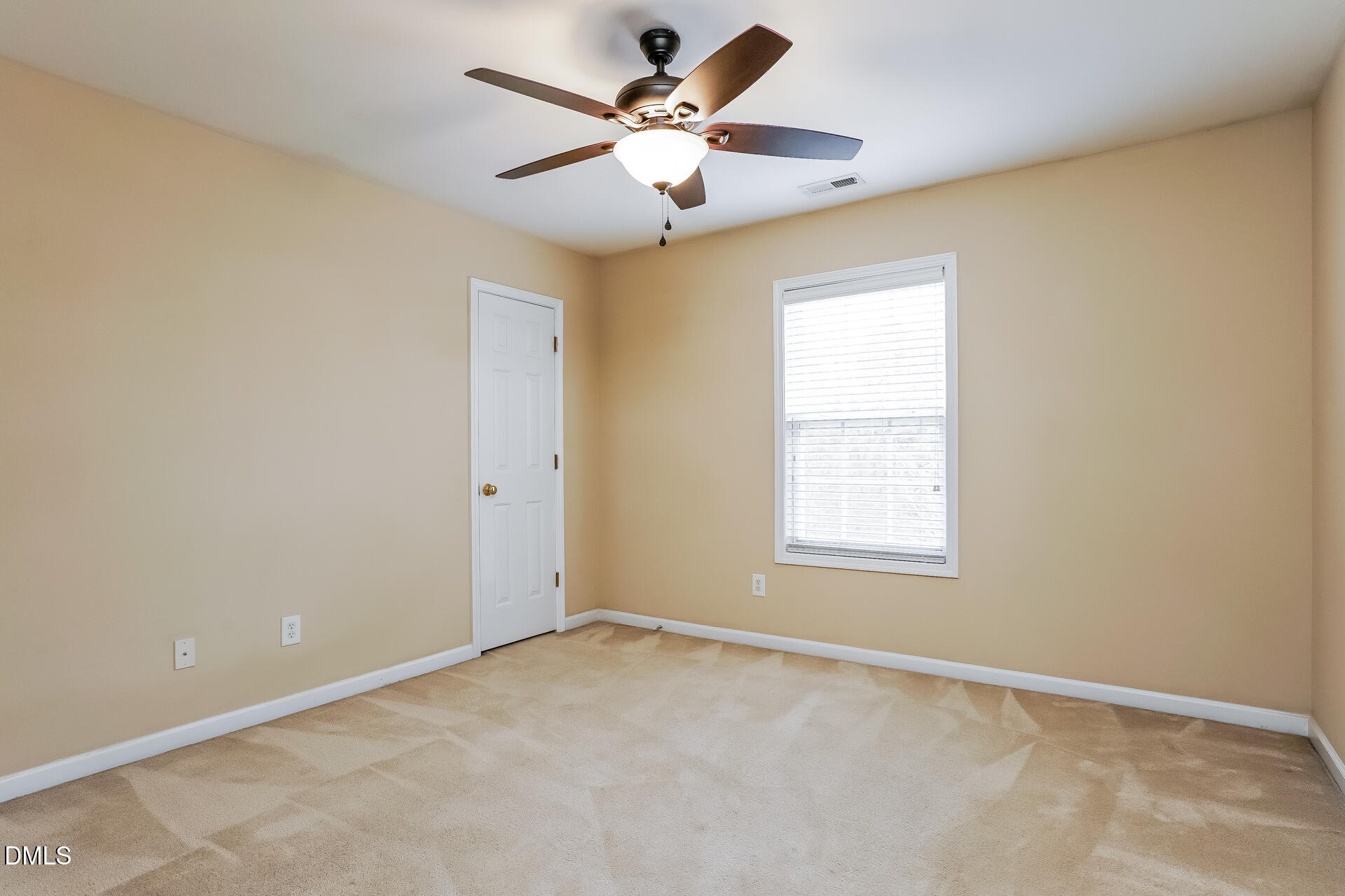 2279 Lazy River Drive Raleigh, NC 27610 - Photo 18 of 24 a view of an empty room with a window