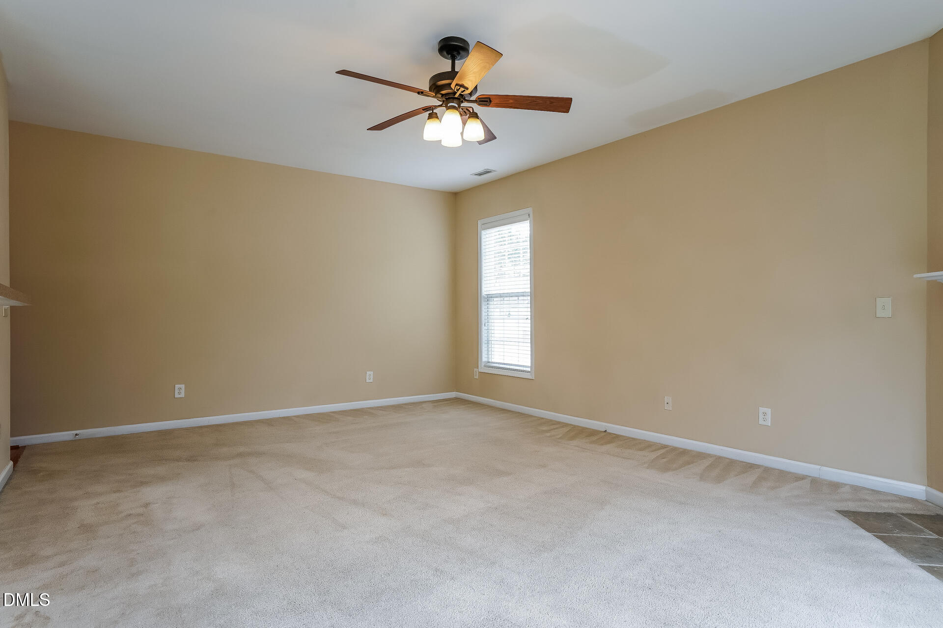 2279 Lazy River Drive Raleigh, NC 27610 - Photo 3 of 24 a view of an empty room with a window