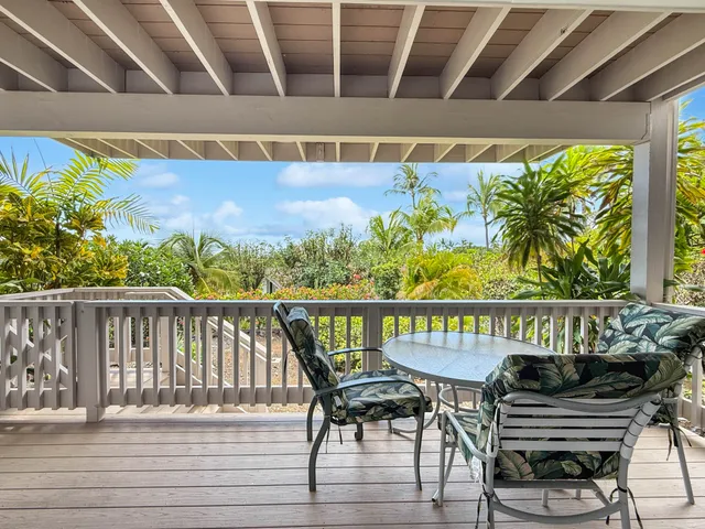 a balcony with wooden floor