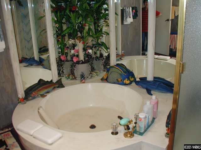 1302 Jones Street Reno, NV 89503 - Photo 6 of 6 a bathroom with a tub and sink