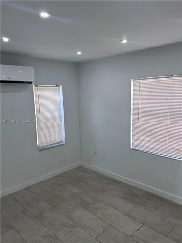 a bathroom with a toilet a sink and shower