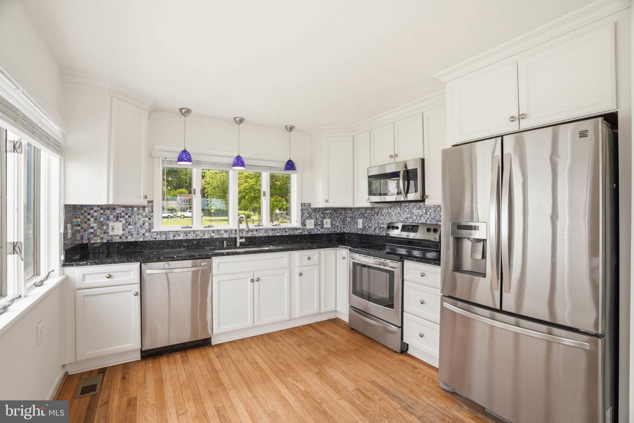 1100 River Bay Road Annapolis, MD 21409 - Photo 32 of 67 Modern kitchen with sleek finishes.