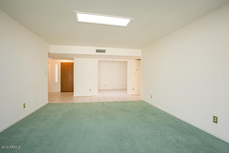 1526 East Royal Palm Road Phoenix, AZ 85020 - Photo 4 of 29 1526 E Royal Palm Pic- Living Room Rever