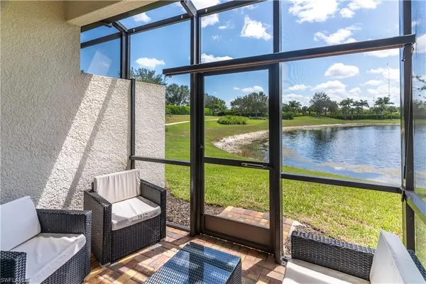 a living room with large windows