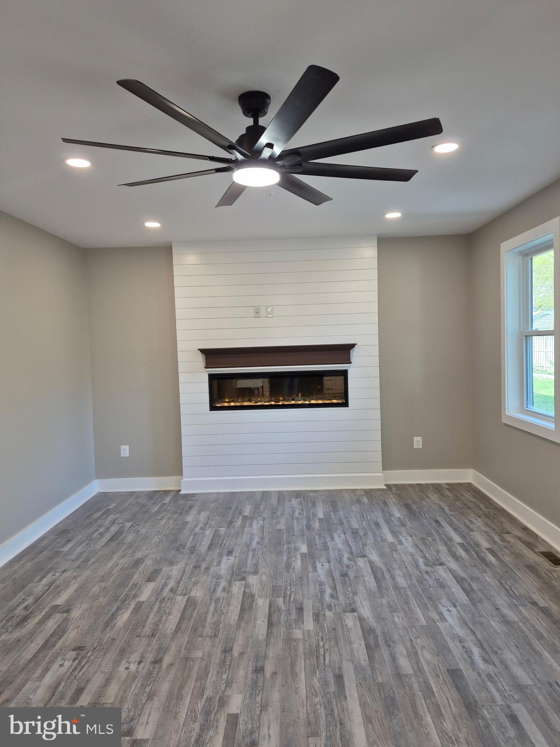 584 Park Road Severna Park, MD 21146 - Photo 3 of 12 Family room with sleek linear fireplace