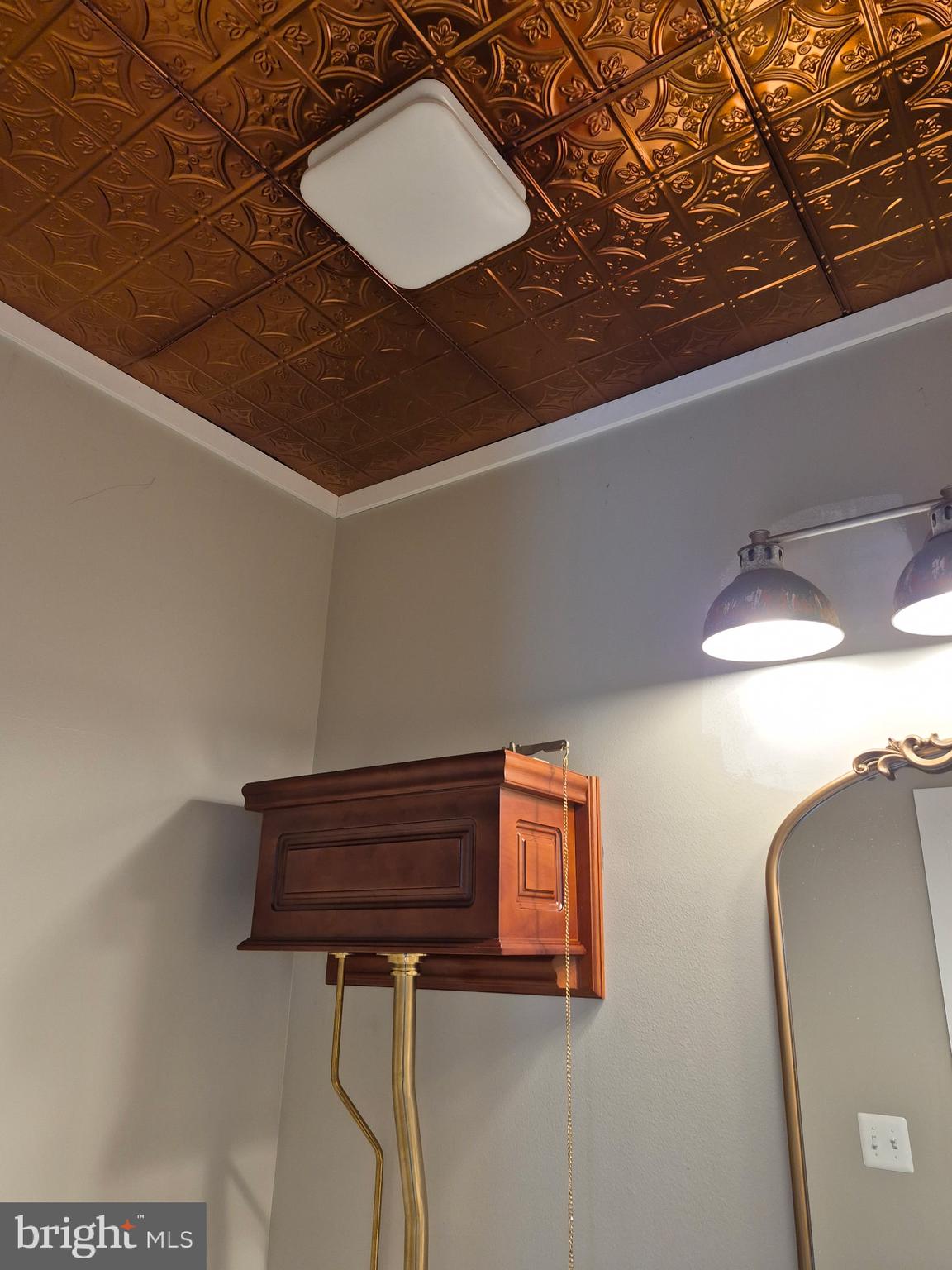 584 Park Road Severna Park, MD 21146 - Photo 5 of 12 Copper-accented ceiling in 1/2 bath