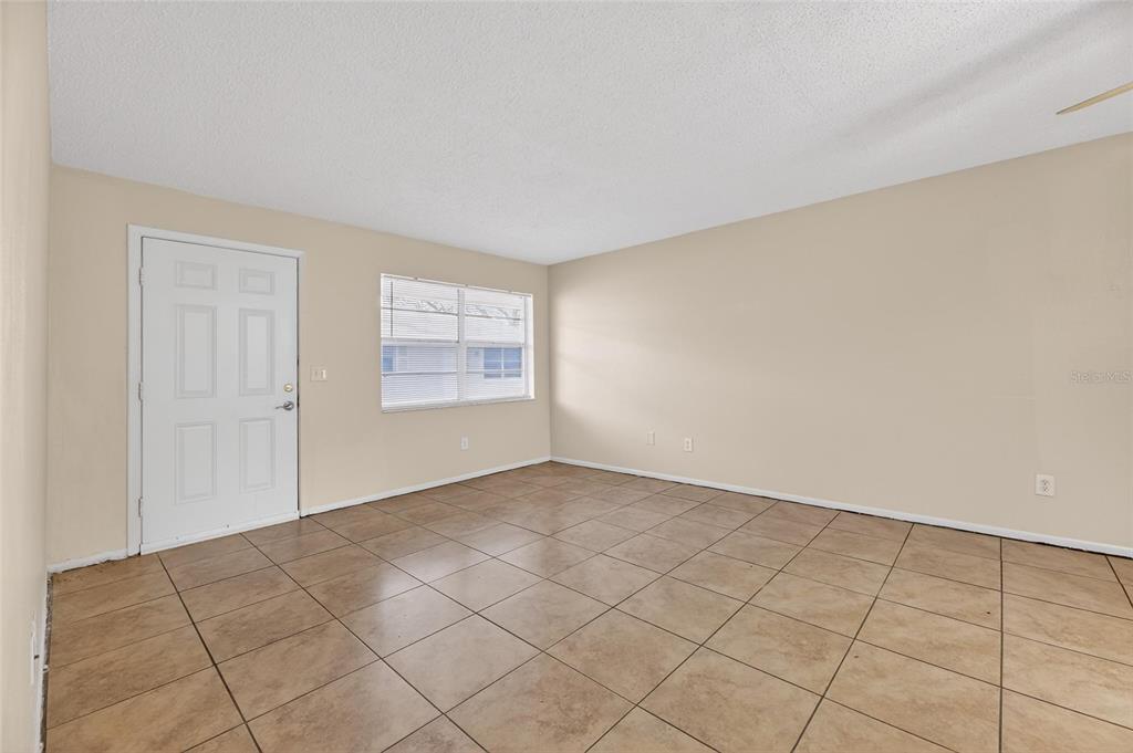 3753 141st Place North Largo, FL 33771 - Photo 17 of 44 a view of an empty room and window