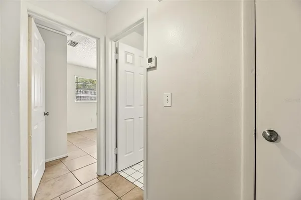 a bathroom with a toilet and bathtub