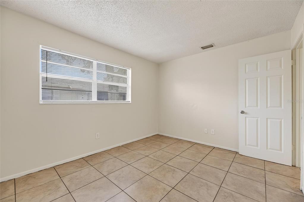 3753 141st Place North Largo, FL 33771 - Photo 38 of 44 a view of an empty room with a window