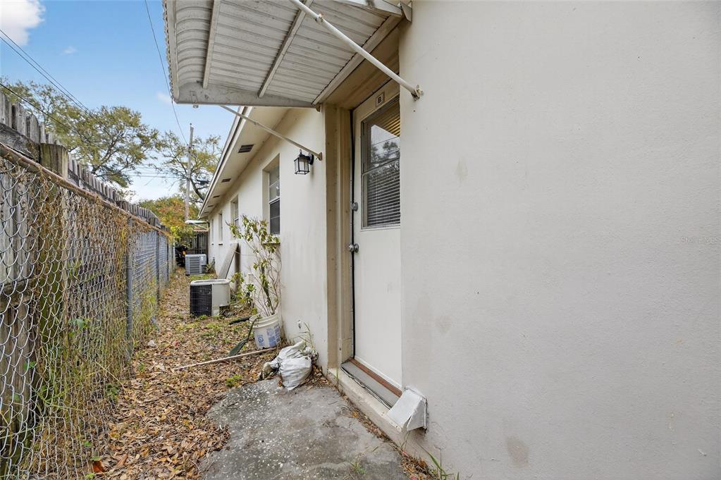 3753 141st Place North Largo, FL 33771 - Photo 40 of 44 a view of a house with a backyard