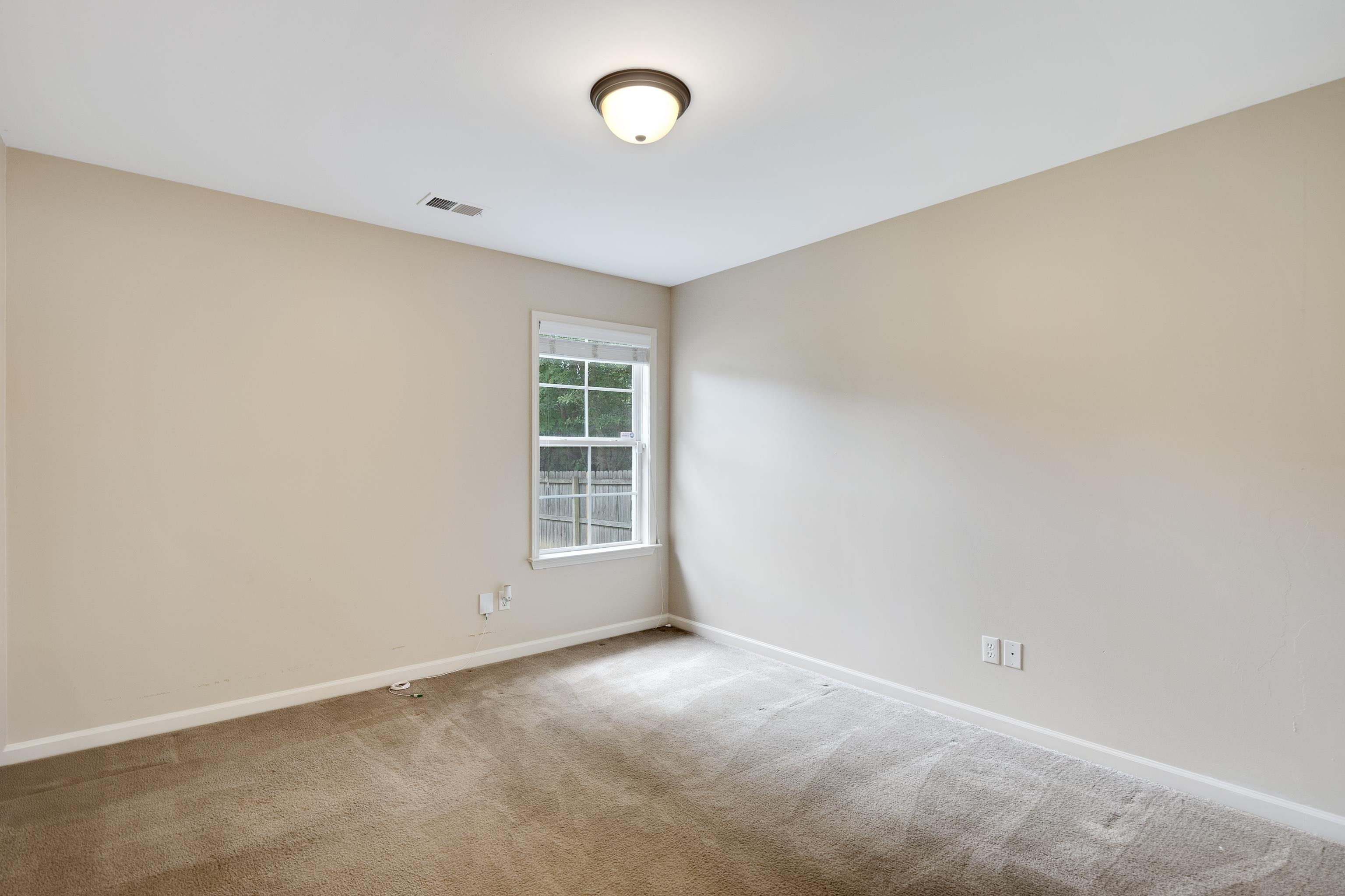 379 Shelton Road Collierville, TN 38017 - Photo 24 of 32 an empty room with windows