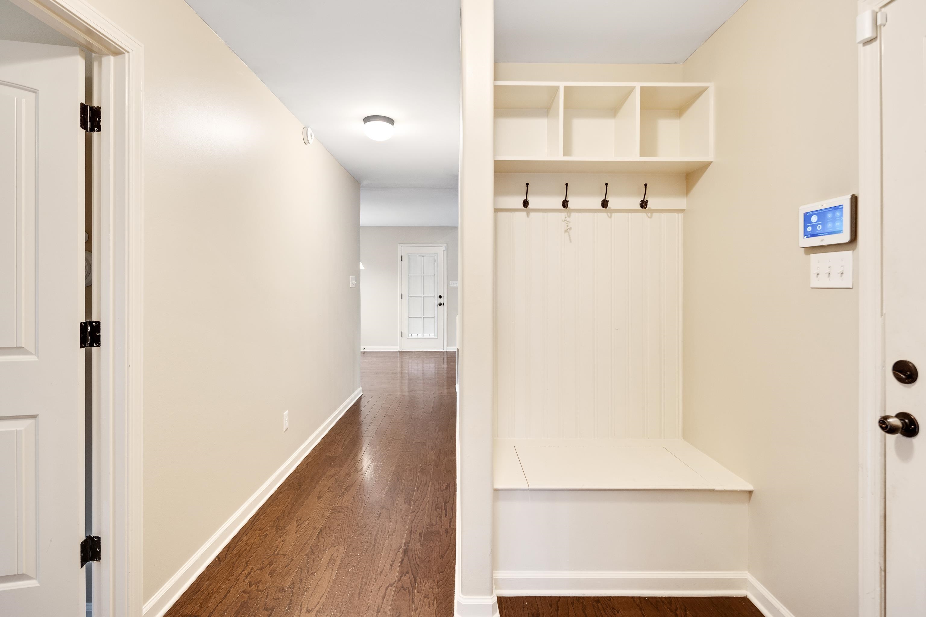 379 Shelton Road Collierville, TN 38017 - Photo 29 of 32 a view of a hallway with wooden floor
