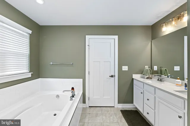 a view of a house with pool and yard