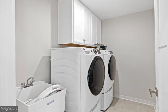 an aerial view of a house with a ocean view
