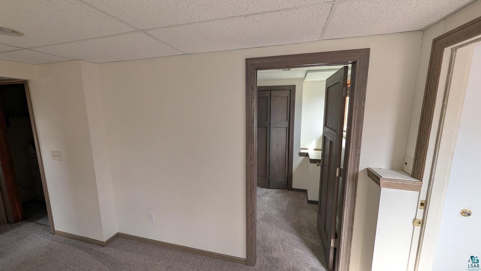 84 Erickson Road Esko, MN 55733 - Photo 13 of 16 White paneled ceiling with recessed lighting