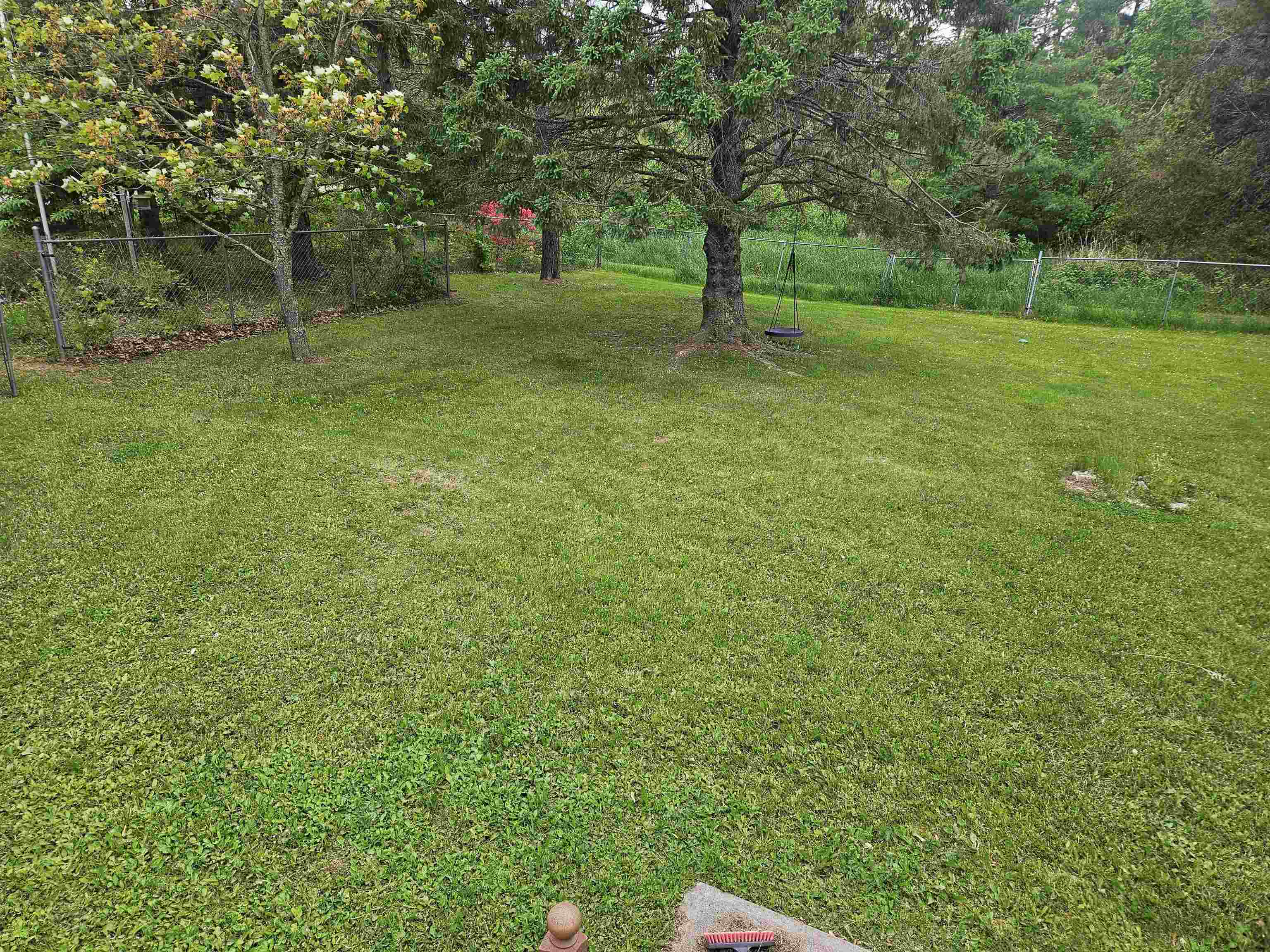 84 Erickson Road Esko, MN 55733 - Photo 2 of 16 View of fenced backyard