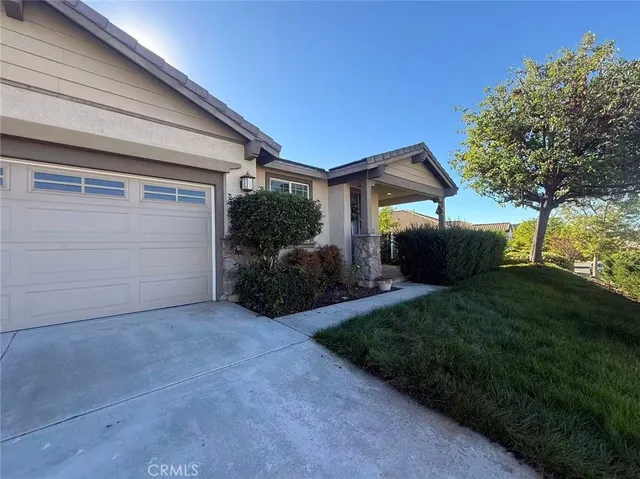 a house view with a garden space