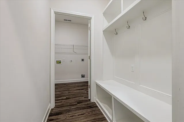 a bathroom with a shower and a sink