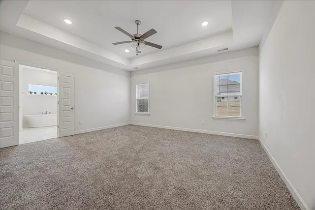 a bathroom with a bathtub a shower a sink and a mirror