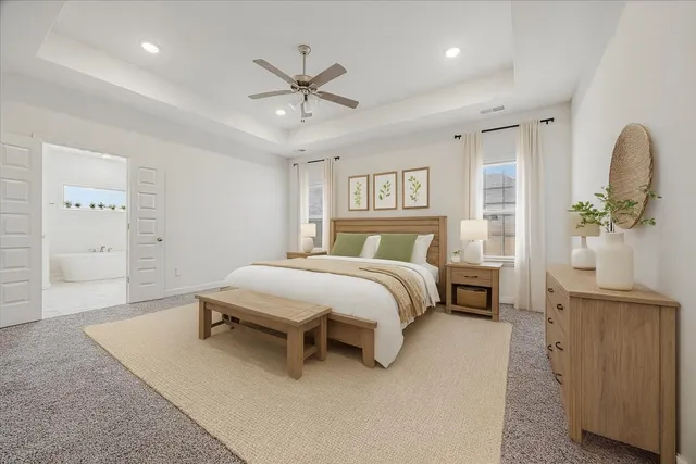 a spacious bathroom with a double vanity sink and a mirror