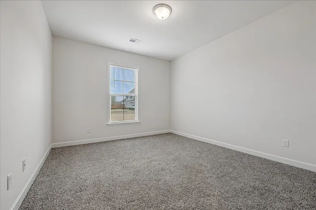 a room with pool table and a ceiling fan