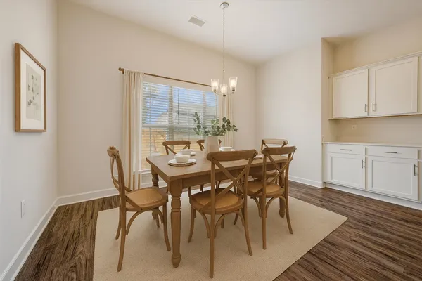 a bathroom with a shower and a sink