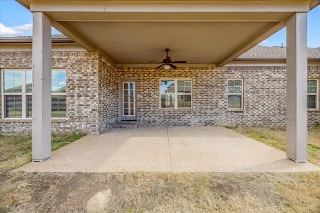 a view of yard with swimming pool and outdoor seating
