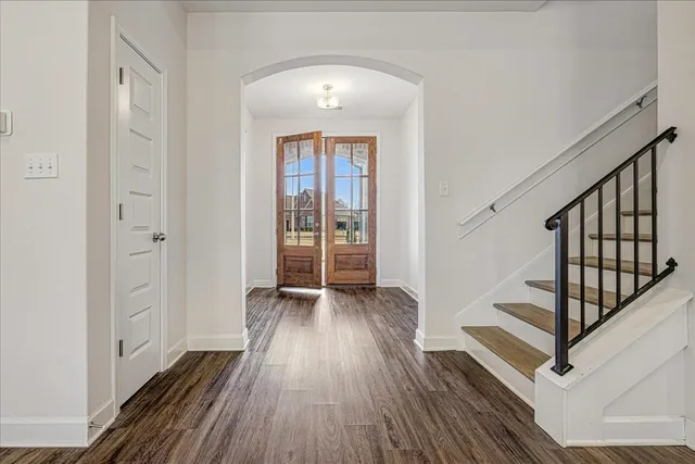 a view of entryway with wooden floor