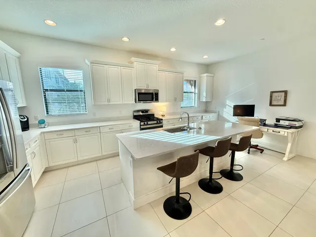 a kitchen with sink cabinets and counter space