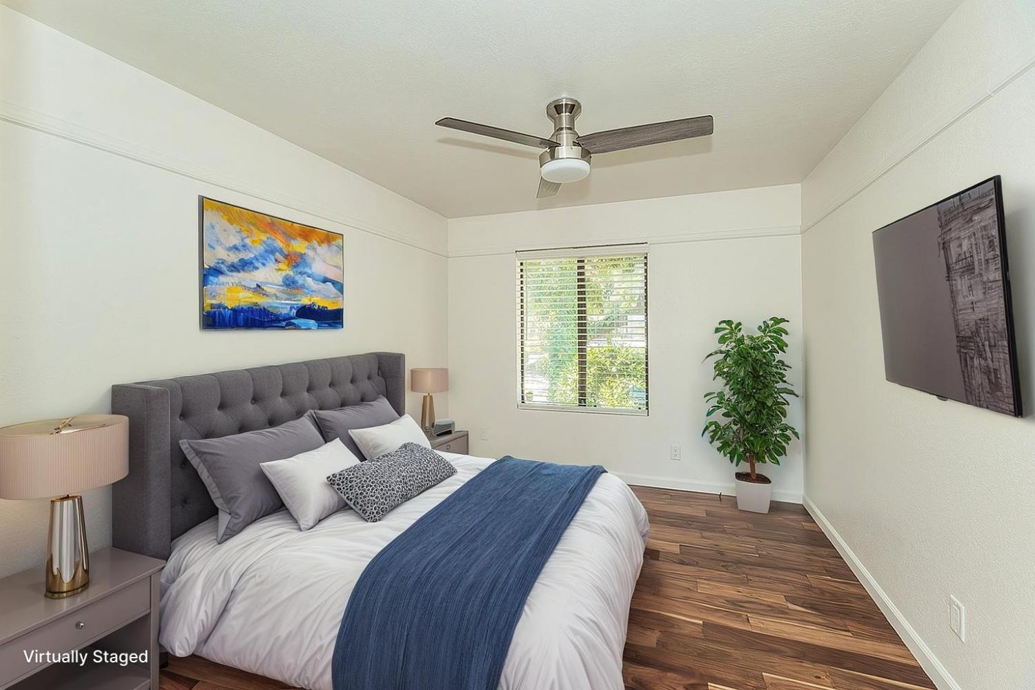 41371 Butte Way Madera, CA 93636 - Photo 24 of 84 a bedroom with a large bed and a window