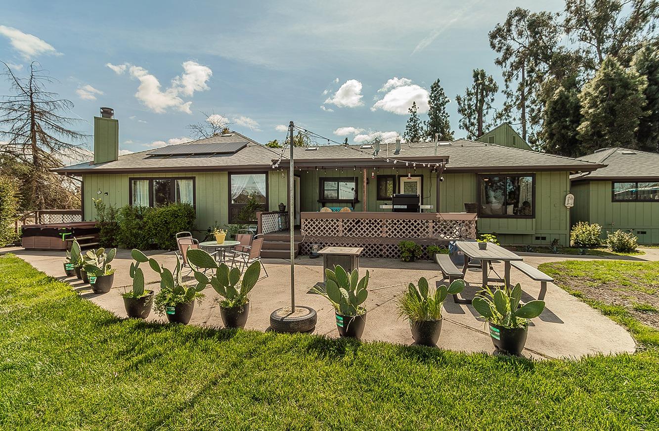 41371 Butte Way Madera, CA 93636 - Photo 39 of 84 a view of a house with a patio