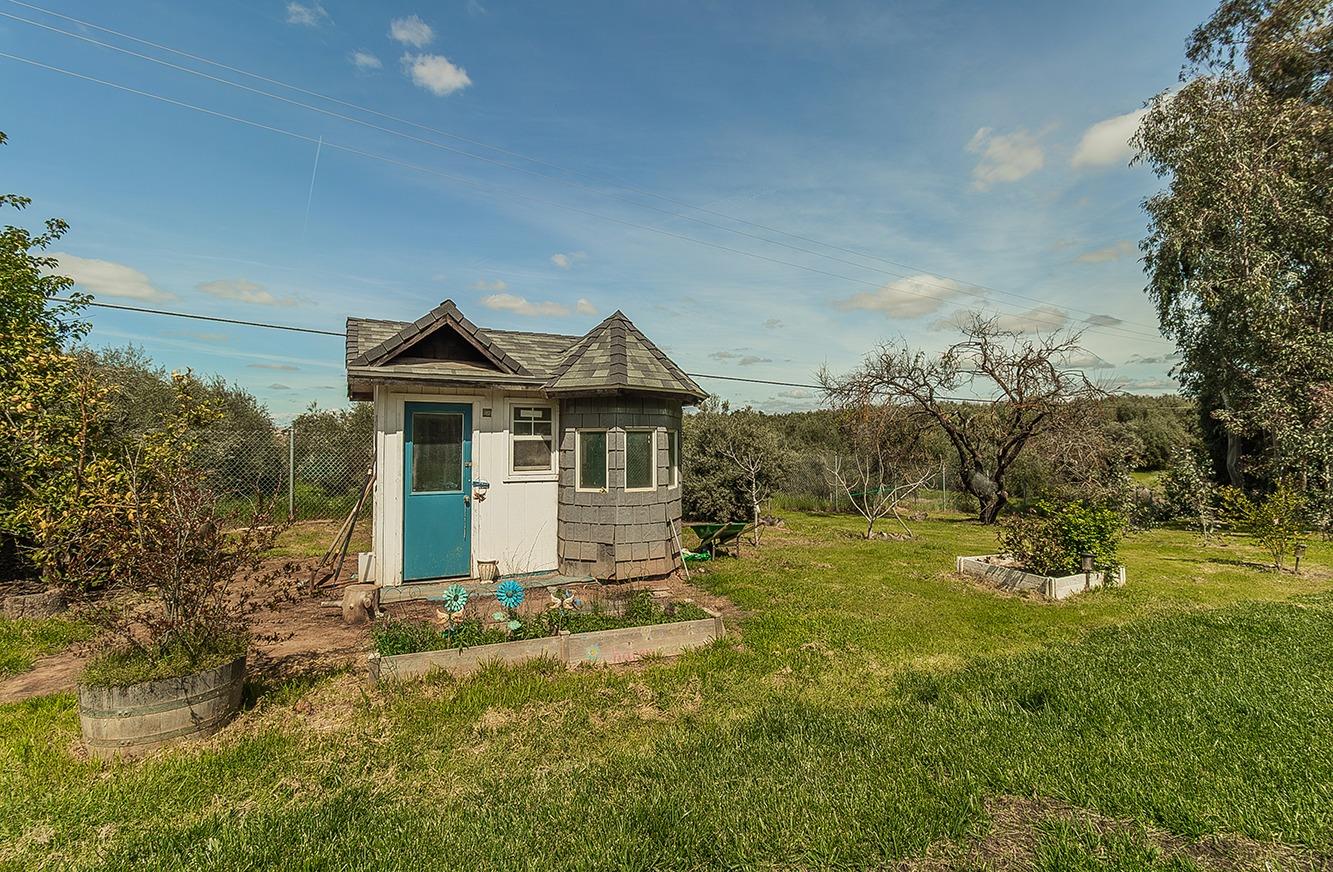 41371 Butte Way Madera, CA 93636 - Photo 43 of 84 a view of a house with a yard