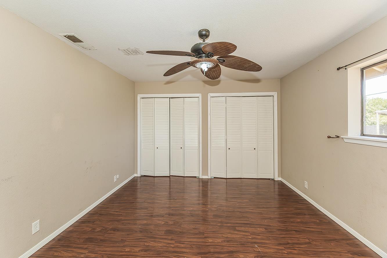 41371 Butte Way Madera, CA 93636 - Photo 54 of 84 a view of room with wooden floor and window