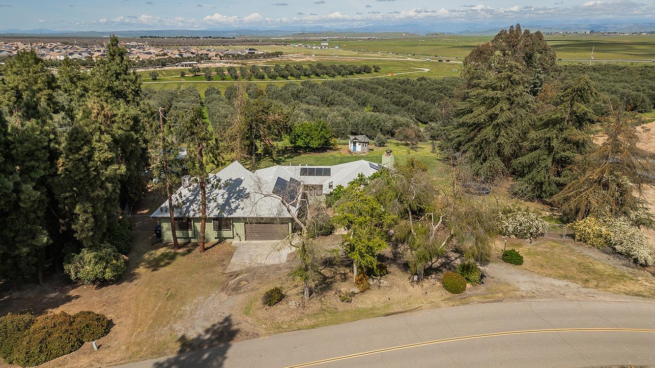 41371 Butte Way Madera, CA 93636 - Photo 75 of 84 a view of a lake with a mountain