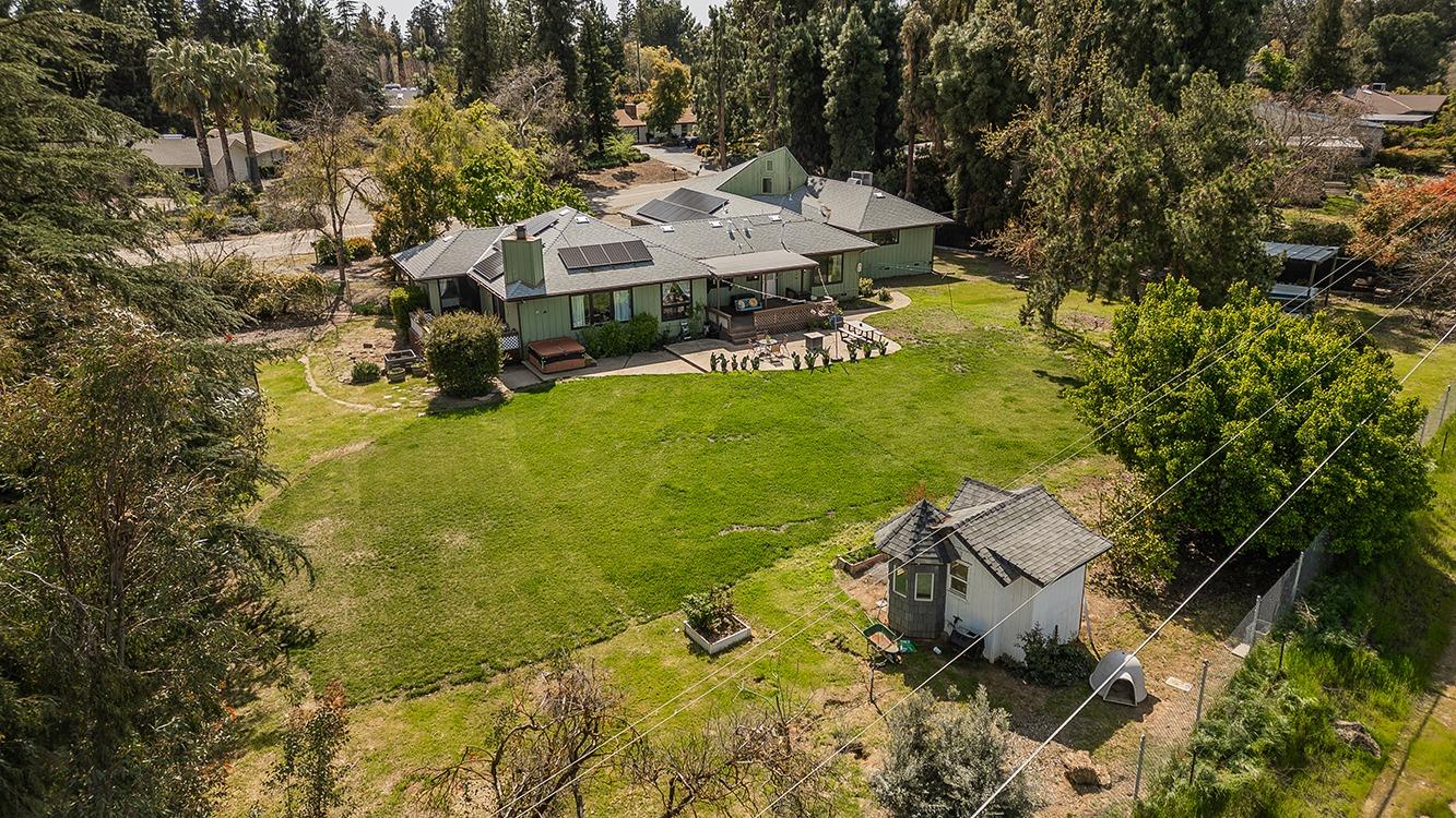 41371 Butte Way Madera, CA 93636 - Photo 81 of 84 an aerial view of a house with garden space and street view