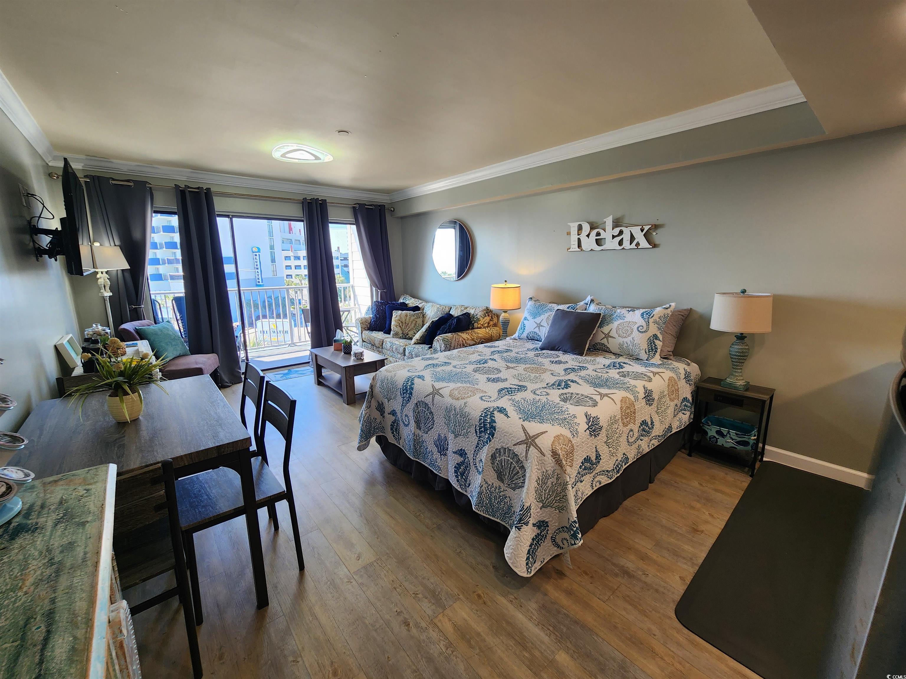 1906 South Ocean Boulevard, Unit 310B Myrtle Beach, SC 29577 - Photo 2 of 34 Bedroom with access to outside, ornamental molding