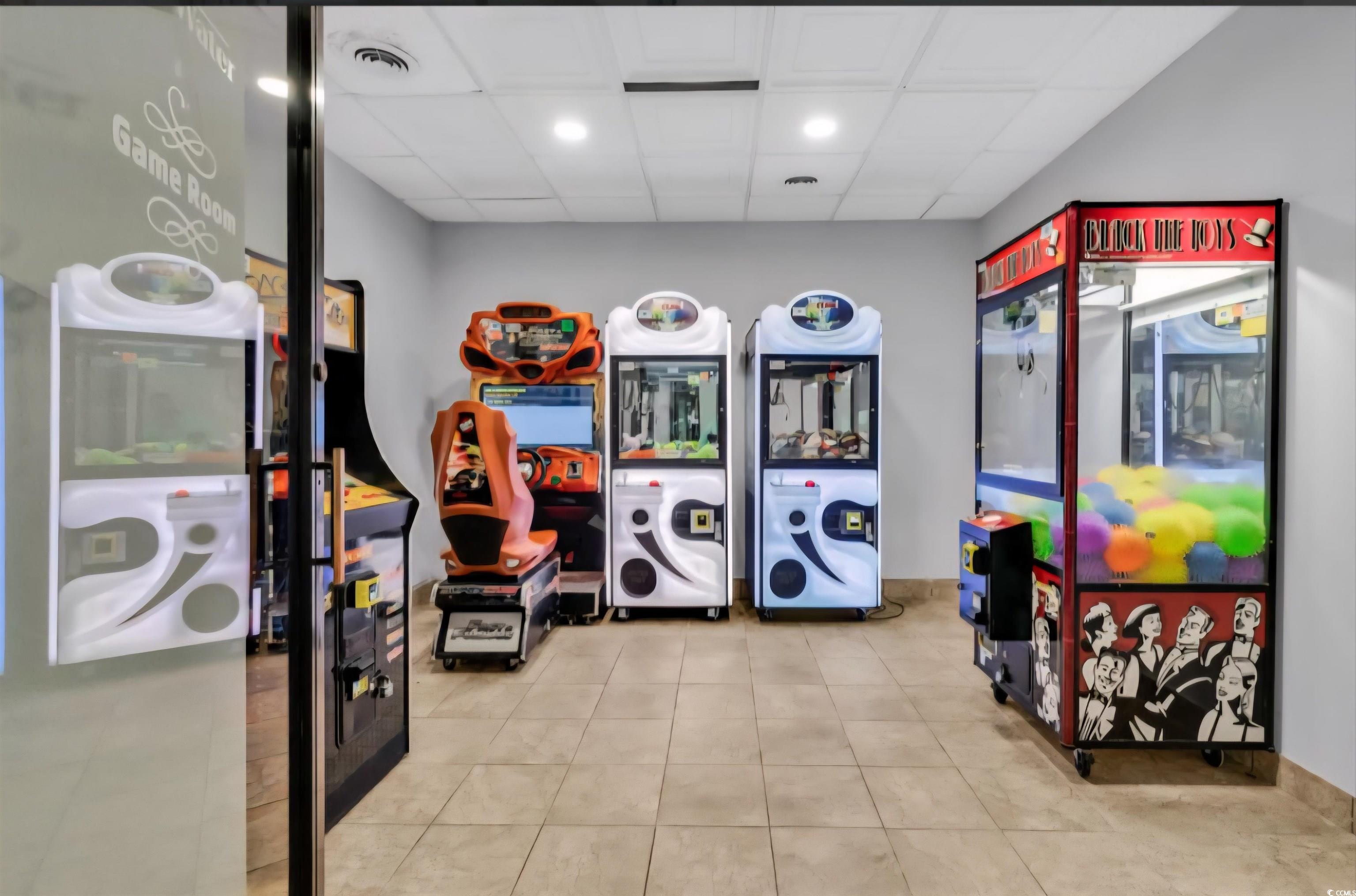 1906 South Ocean Boulevard, Unit 310B Myrtle Beach, SC 29577 - Photo 32 of 34 Rec room featuring a paneled ceiling, tile pattern
