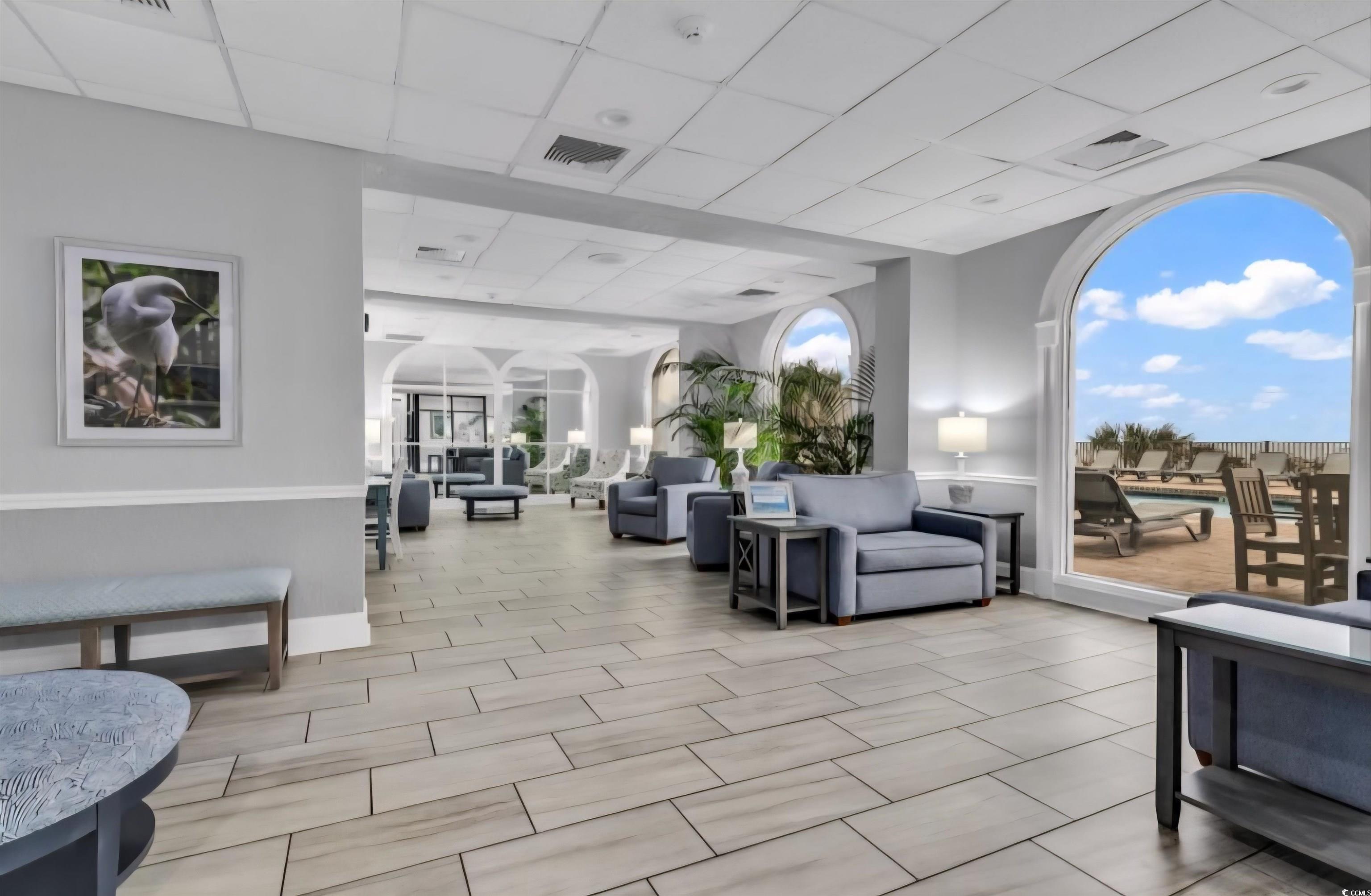 1906 South Ocean Boulevard, Unit 310B Myrtle Beach, SC 29577 - Photo 33 of 34 Community lobby with a paneled ceiling
