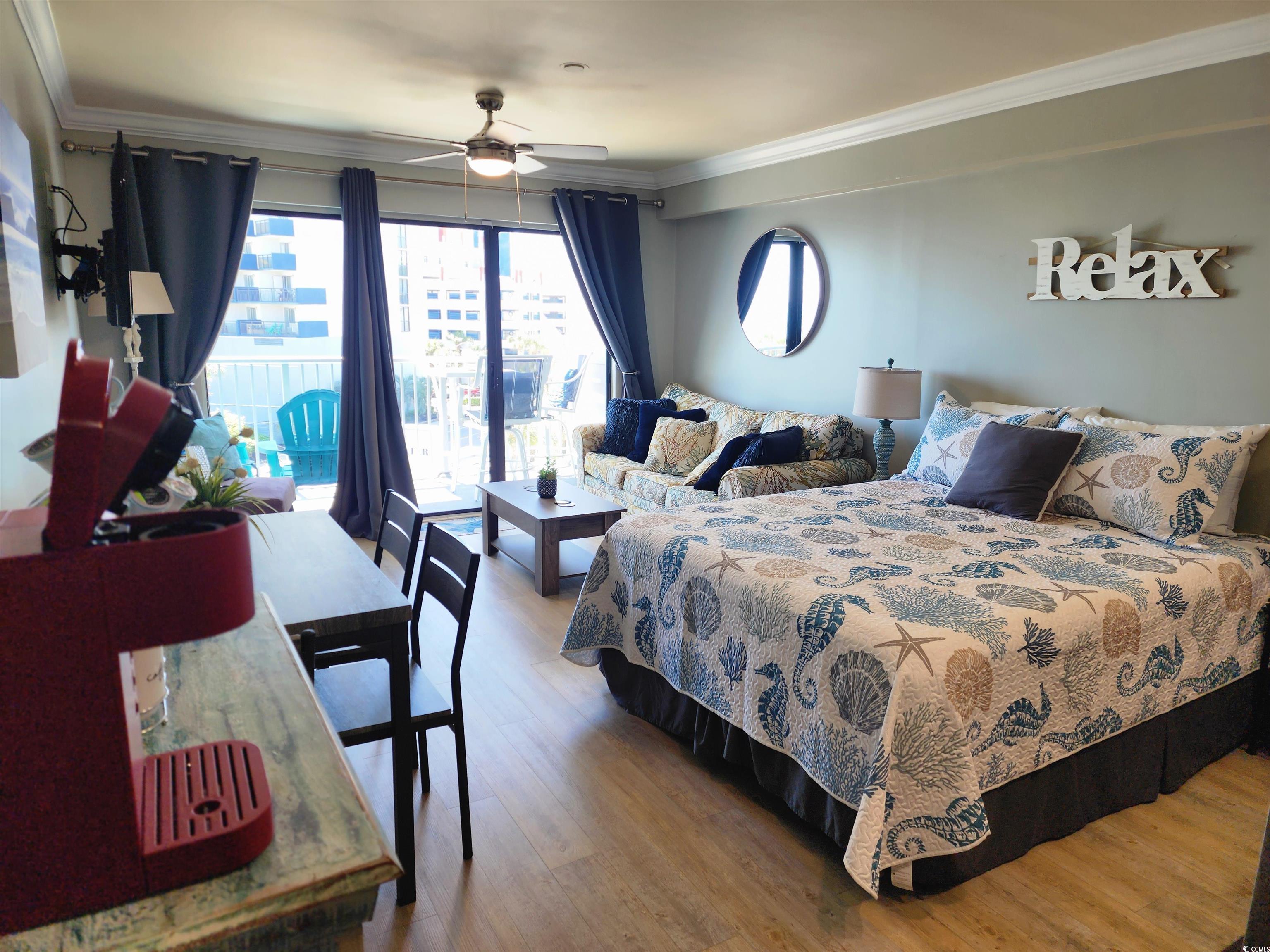 1906 South Ocean Boulevard, Unit 310B Myrtle Beach, SC 29577 - Photo 8 of 34 Bedroom featuring ornamental molding, access to ex