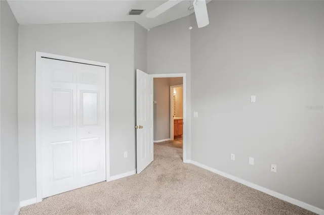 a view of hallway with closet